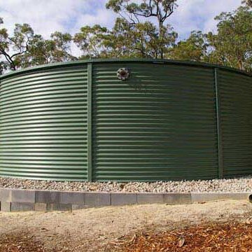 Green corrugated water tank heritage